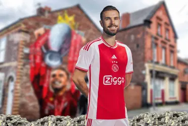 Henderson next to a house and a lot of money