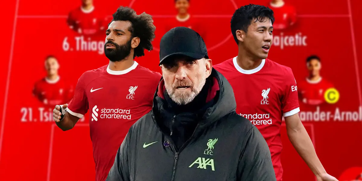 Klopp serious with Salah and Endo in the background