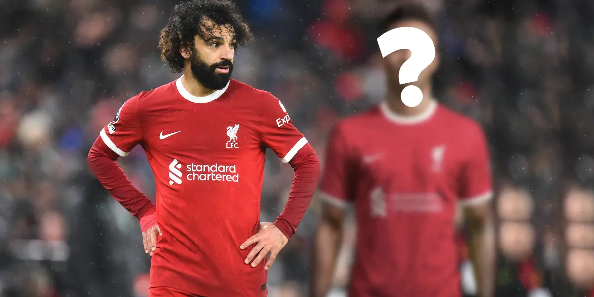 Salah very worried and serious next to an unknown player 